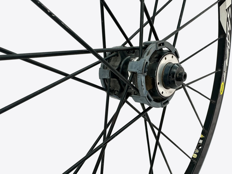 Close-up of a bicycle wheel with a white background