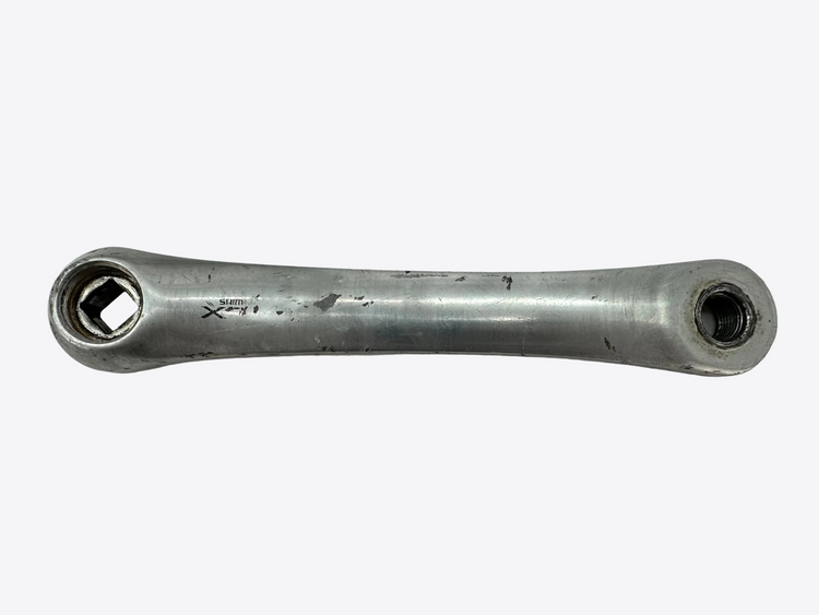 Metallic crank arm on a white background