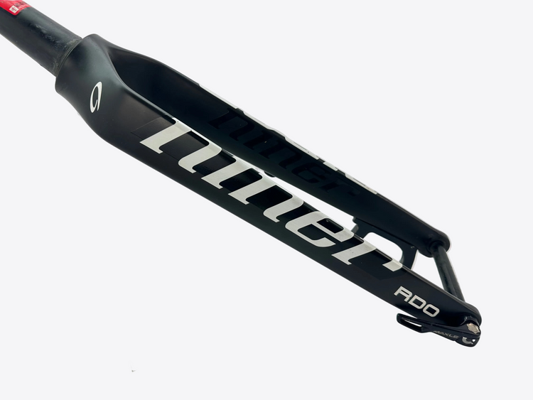Black bicycle fork with 'Niner' branding on a white background
