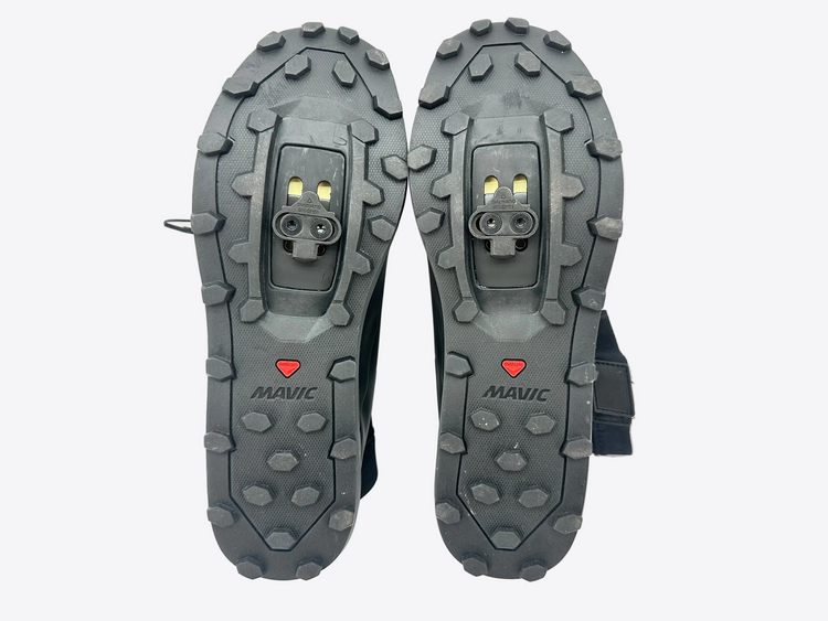Pair of Mavic cycling shoes with tread pattern on a white background