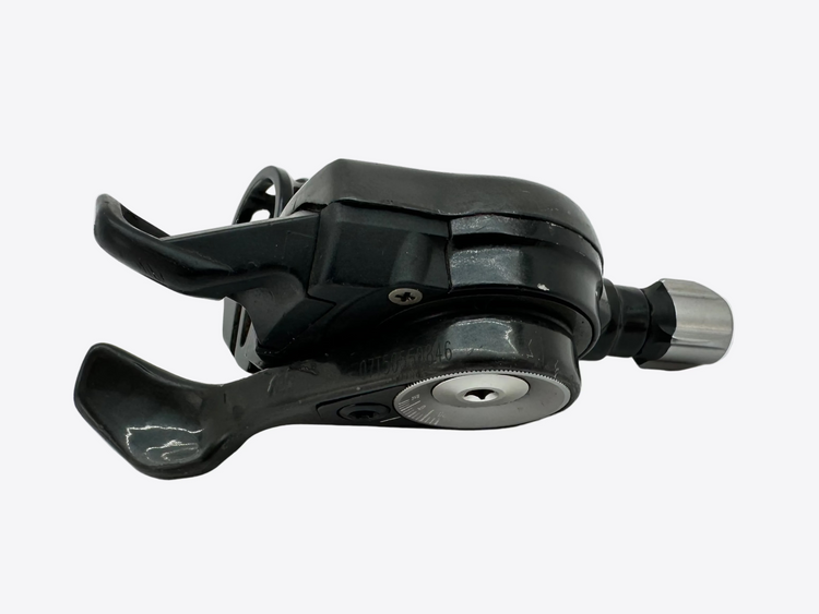 Black bicycle gear shifter on a white background