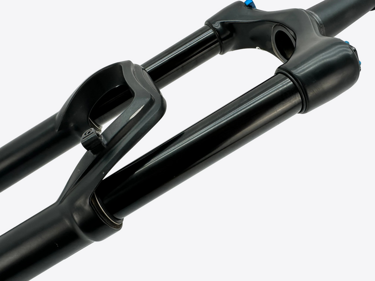 Close-up of a black bicycle fork on a white background