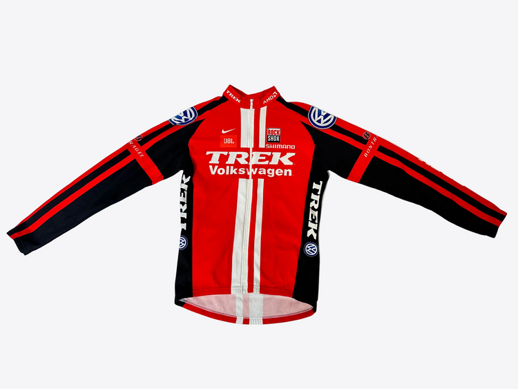 Red and black cycling jersey with visible branding on a white background