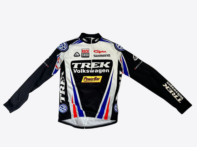 Cycling jersey with multiple brand logos on a white background