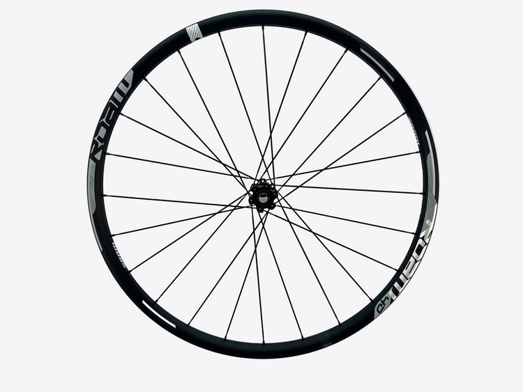 Bicycle wheel with black rim and white wall on a light gray background