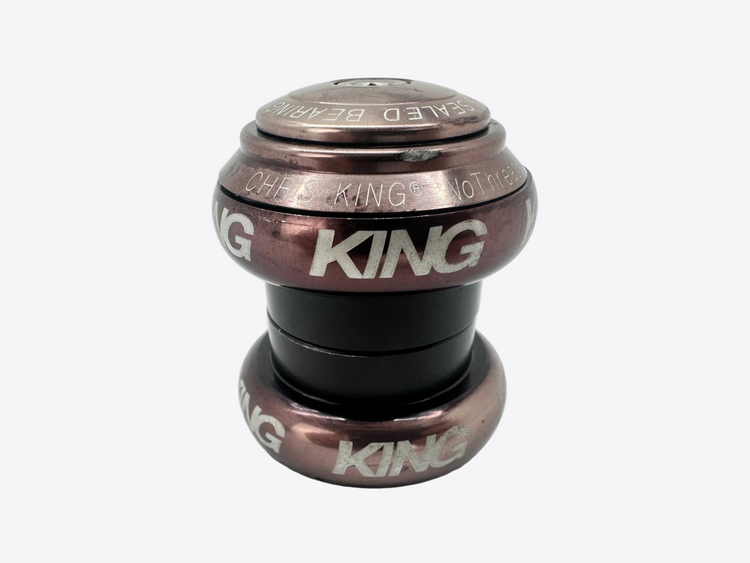 Bicycle headset with 'King' branding on a white background