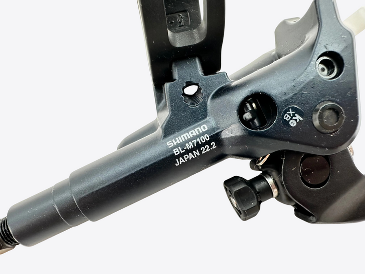 Close-up of a Shimano bicycle component on a white background