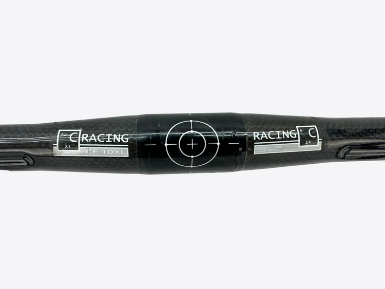 Carbon fiber rod with 'Racing' branding on a gray background