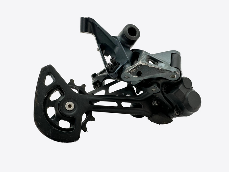 Black mechanical component on a white background