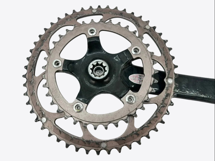 Bicycle crankset with chainring on a white background