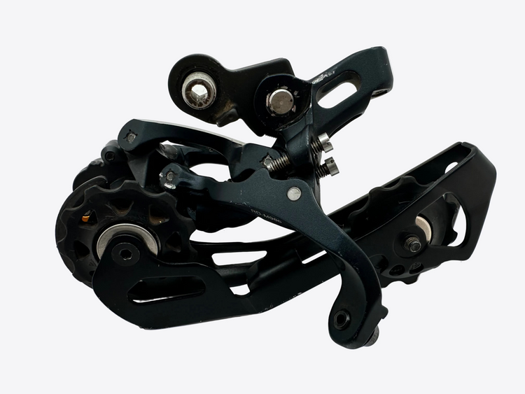 Black bicycle gear mechanism on a white background
