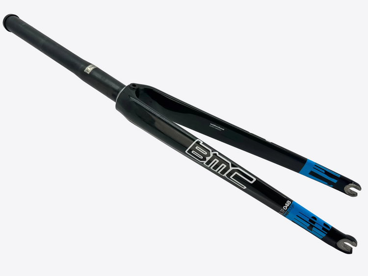 Bicycle fork with BMC logo on a white background