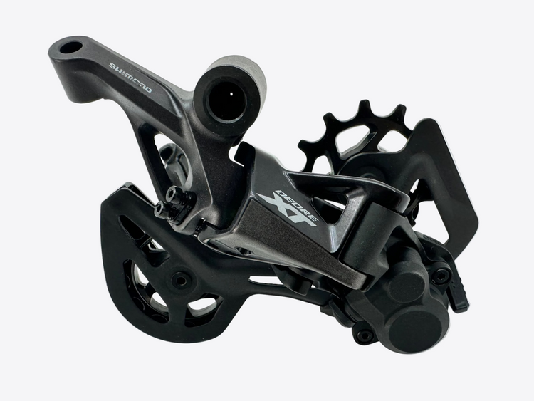Black bicycle gear mechanism on a white background