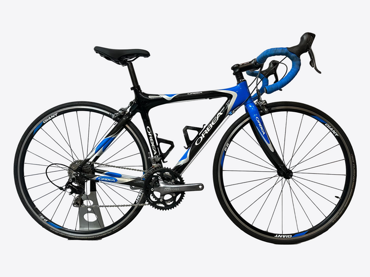 Blue and black bicycle on a white background