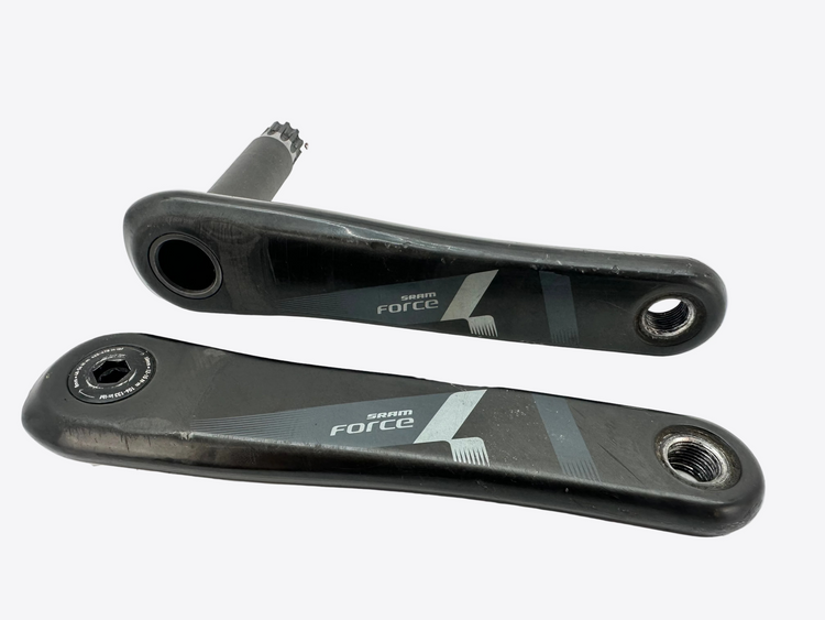 Two bicycle cranks with 'Shimano Force' branding on a white background