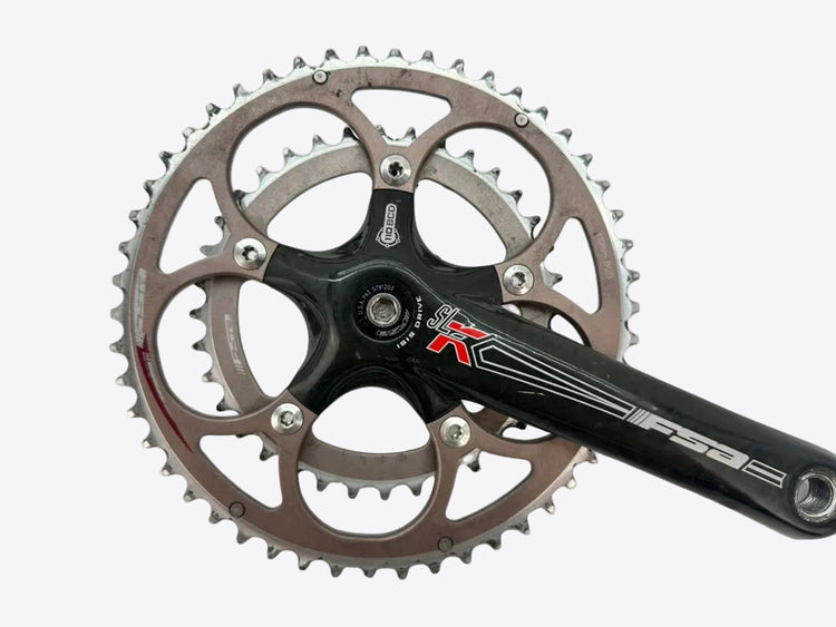 Bicycle crankset with chainring on a white background