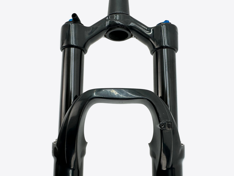 Close-up of a black bicycle fork on a white background