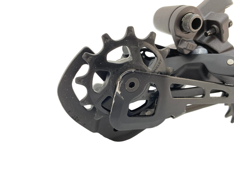 close up of scratches on the derailleur cage