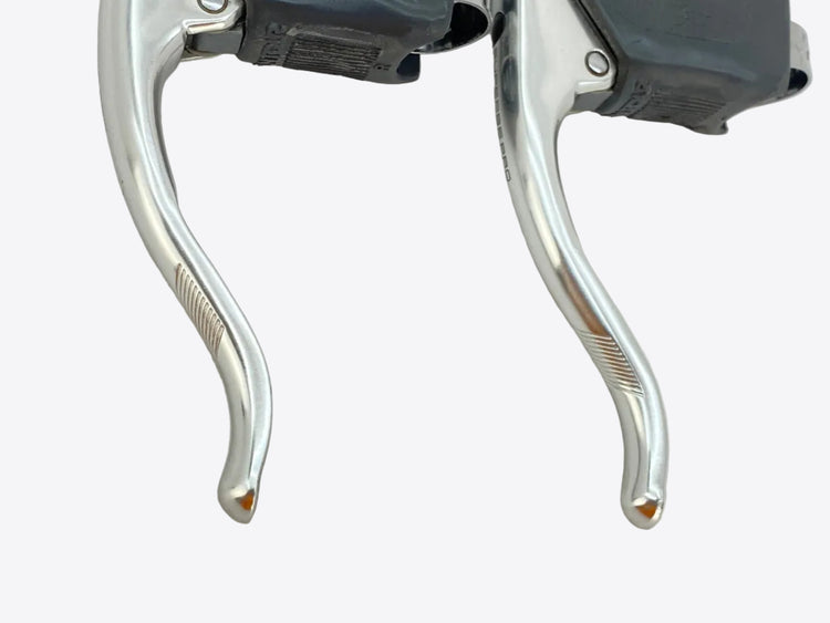one side of the levers
