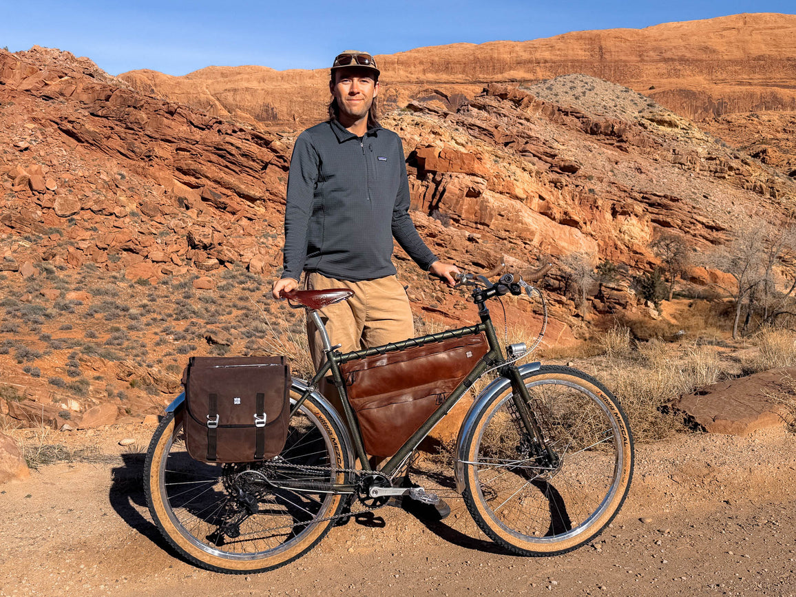 Picture of River Murdock with his bike on the White Rim in Moab, Utah