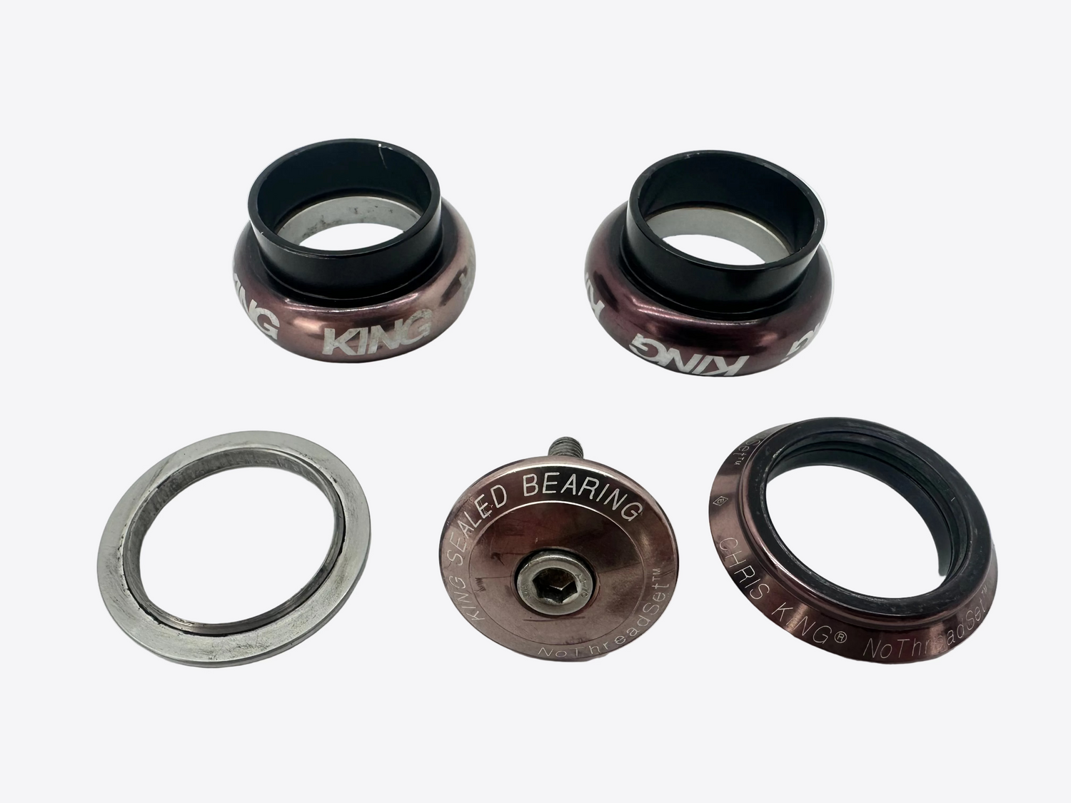Four metal bearings with 'King' branding on a white background