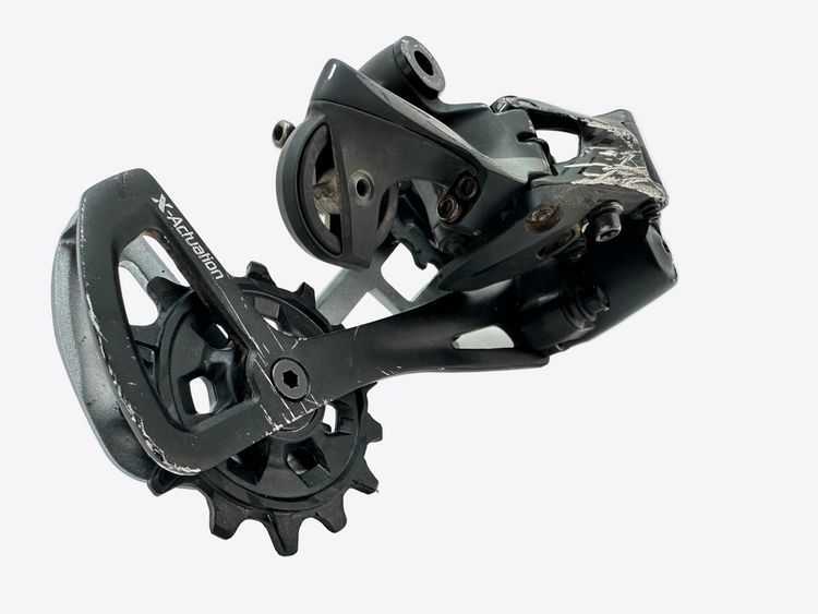 Close-up of a bicycle gear system on a white background
