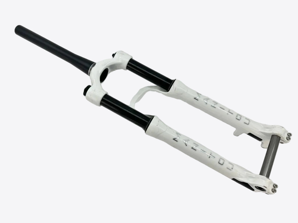 White bicycle fork with black accents on a light gray background