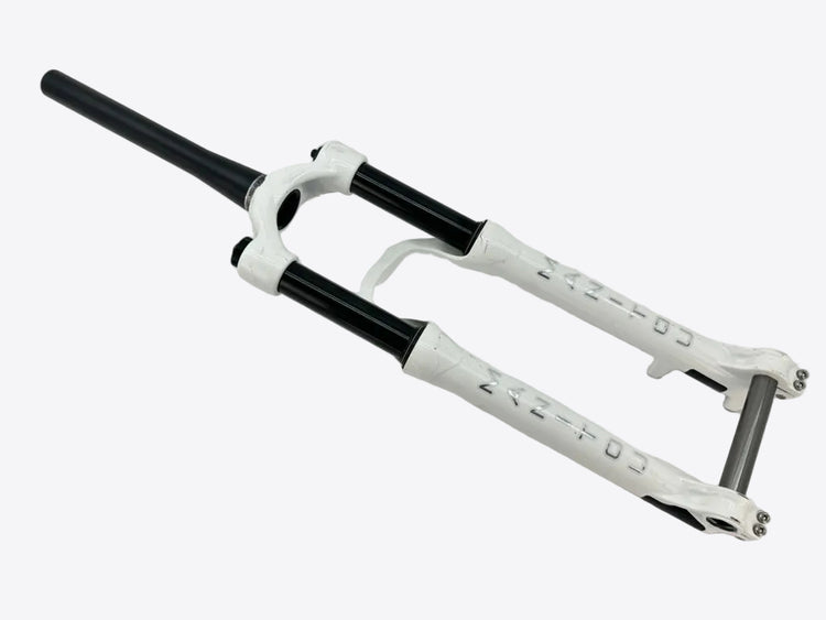 White bicycle fork with black accents on a light gray background