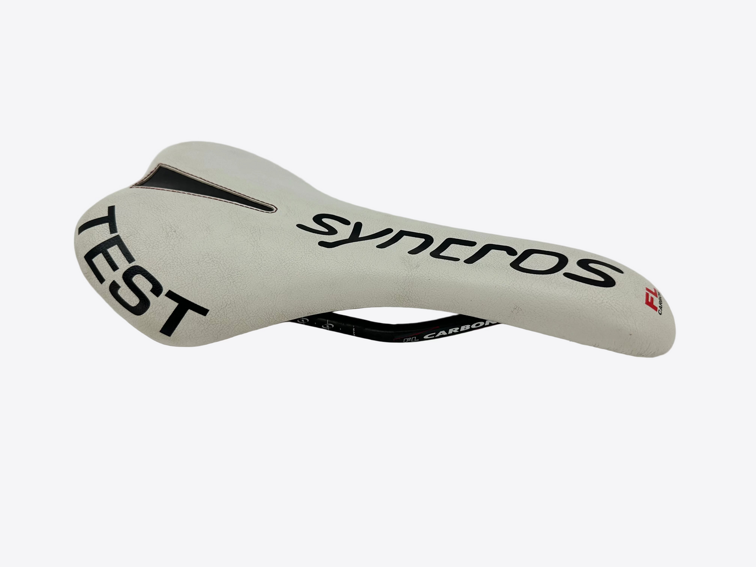 White bicycle saddle with 'syncros' branding on a white background