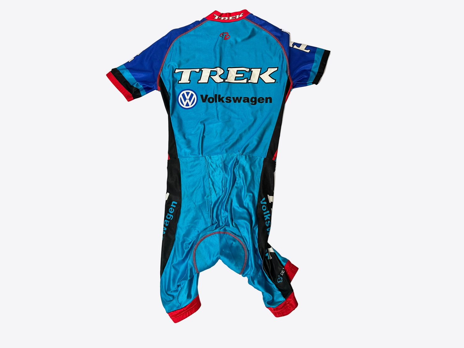 Blue racing suit with Trek and Volkswagen logos on a white background