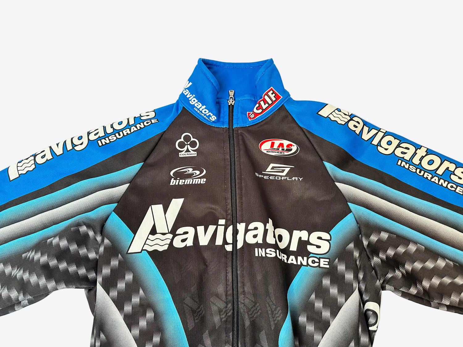 Black cycling jacket with blue and white accents featuring various brand logos on a light gray background.