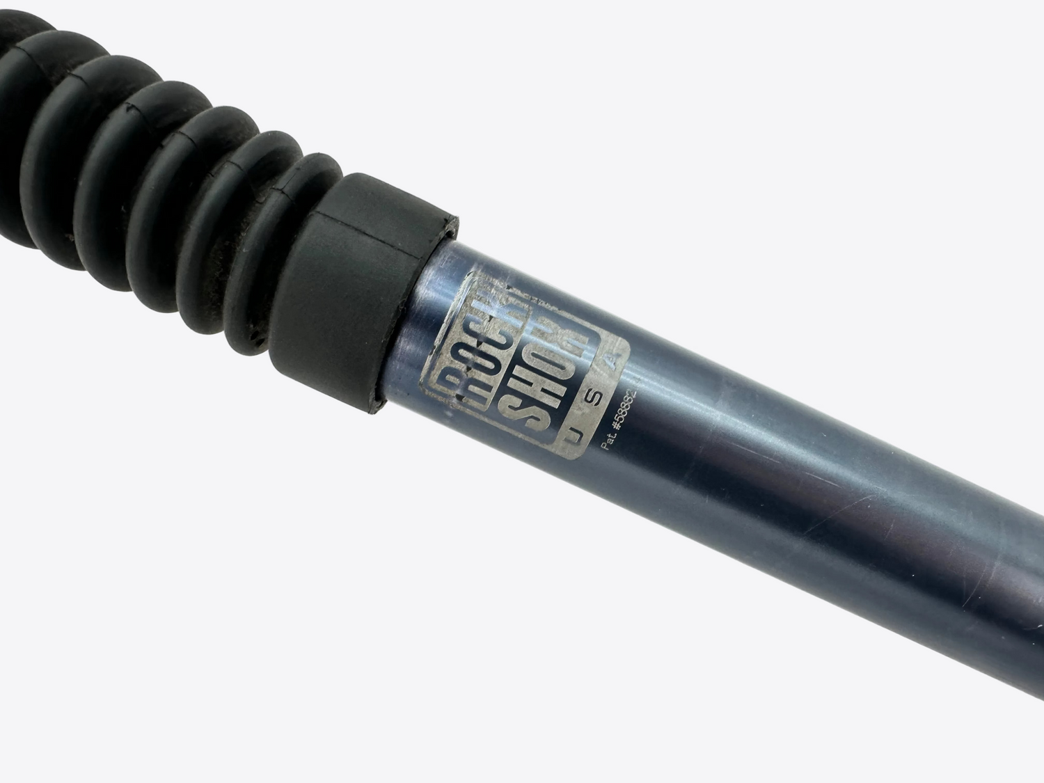 Rock Shock shock absorber on a white background