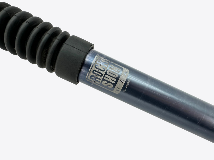 Rock Shock shock absorber on a white background