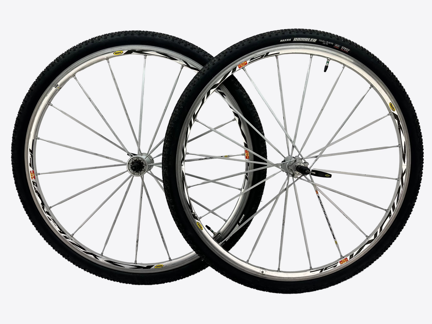 Two bicycle wheels on a white background