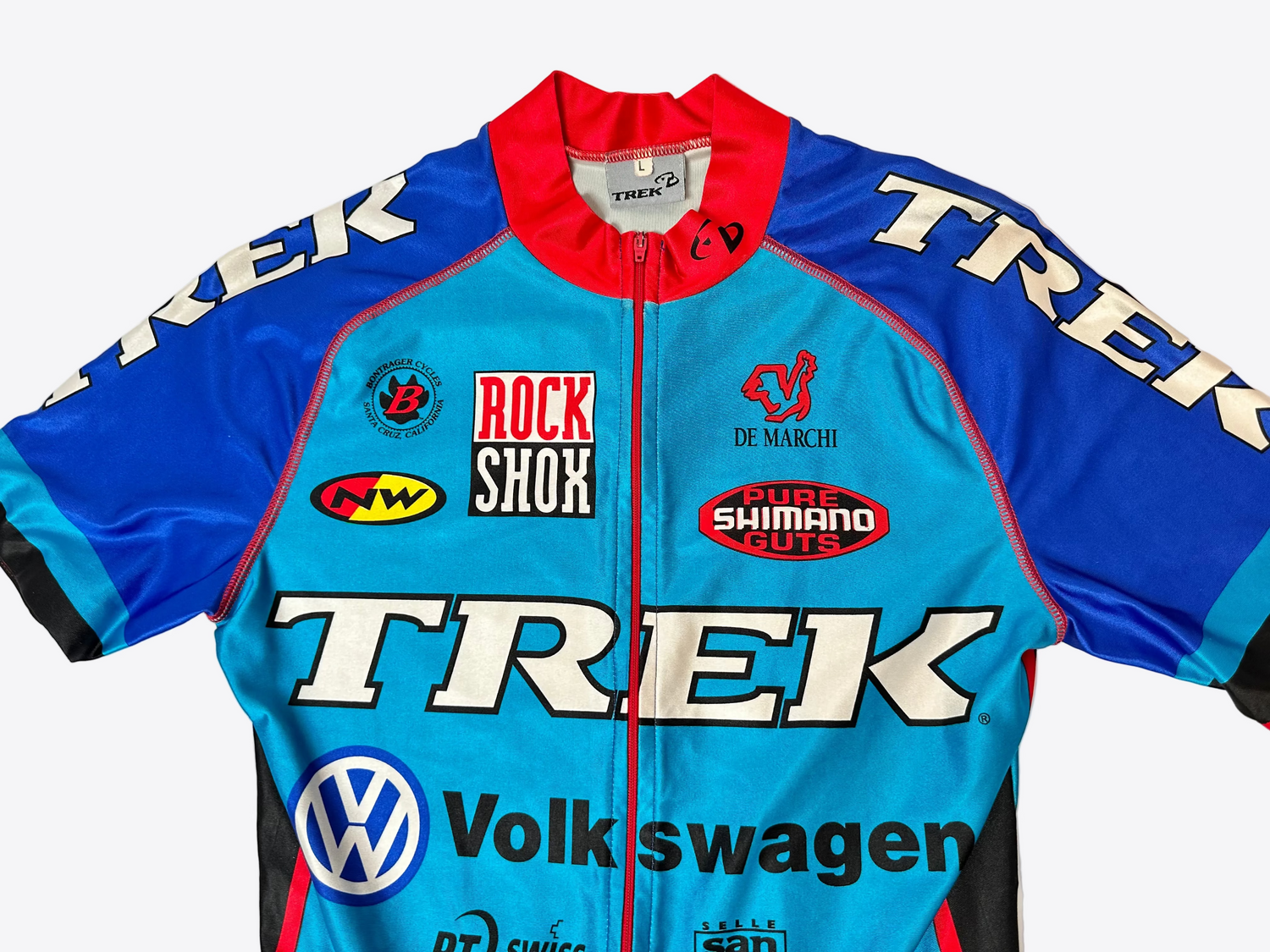 Cycling jersey with multiple brand logos on a white background