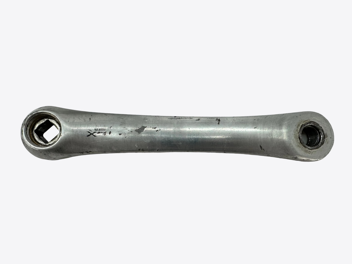 Metallic crank arm on a white background