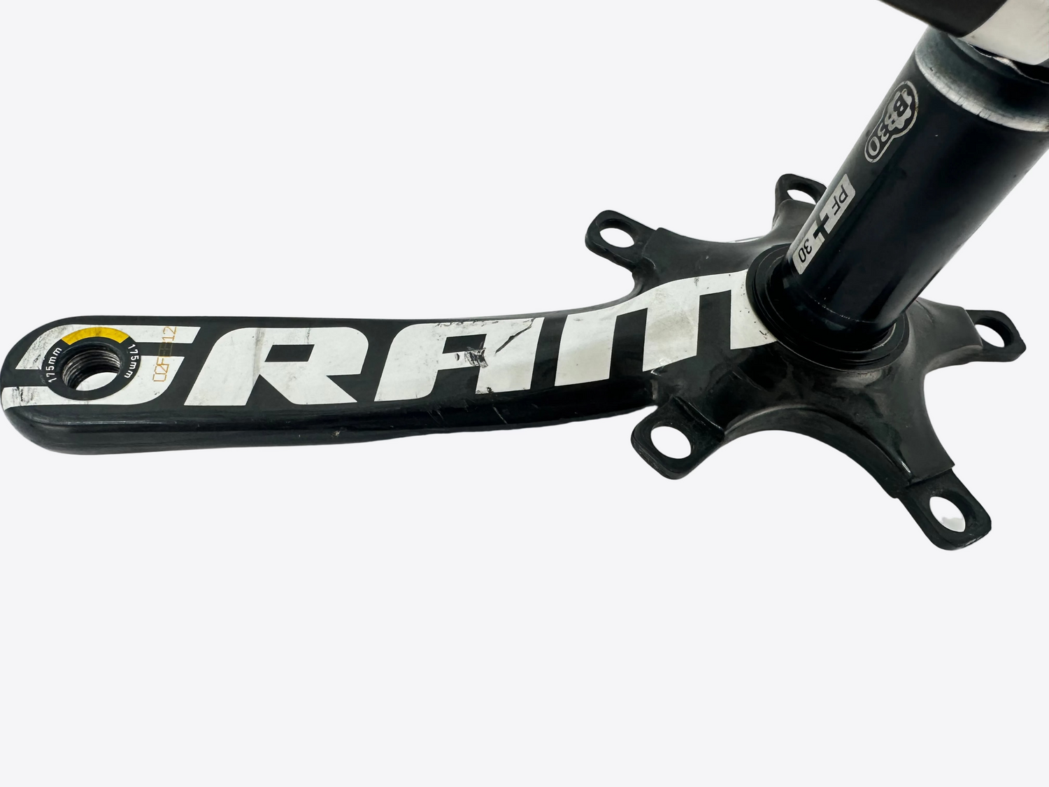 Bicycle crankset with 'Sram' branding on a white background