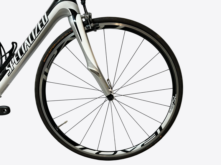 Bicycle wheel with 'Specialized' branding on a white background