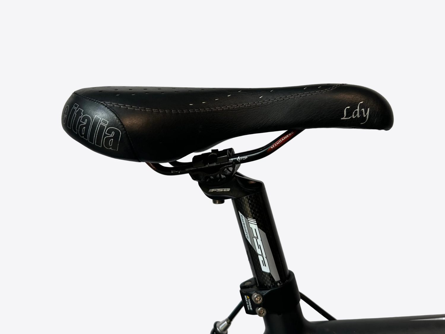 Bicycle seat with 'Italia' branding on a white background
