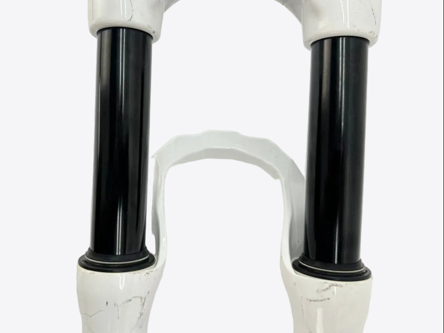 Close-up of a white and black mechanical component on a white background