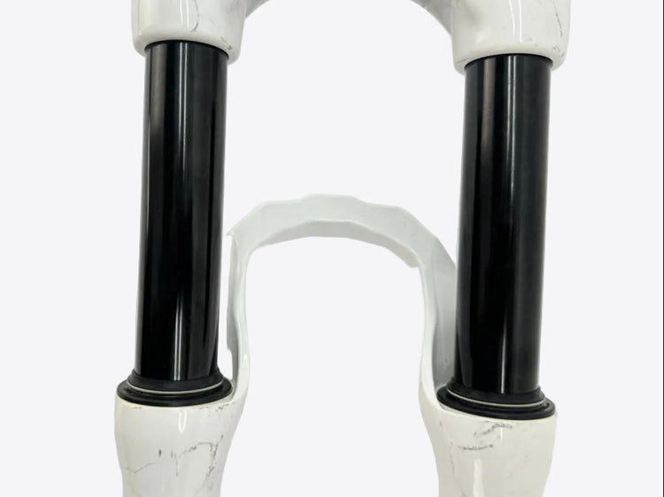 Close-up of a white and black mechanical component on a white background