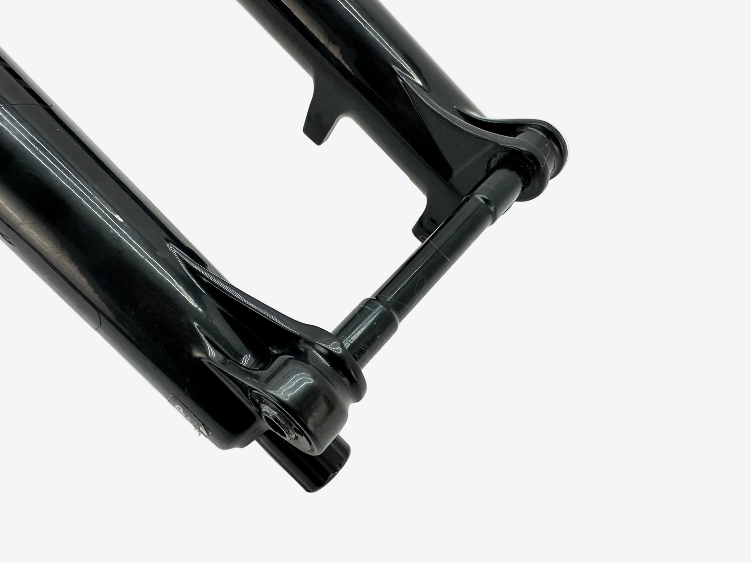 Close-up of a black metal bicycle frame on a white background