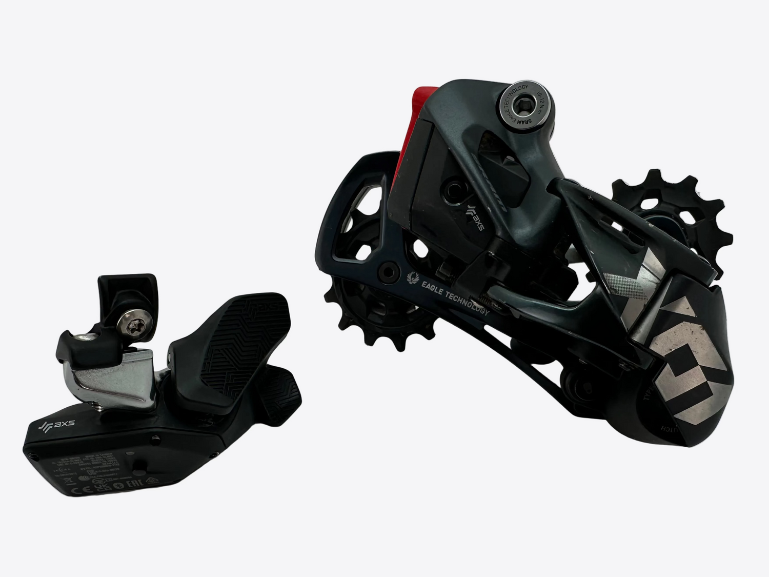 Two black mechanical components on a white background