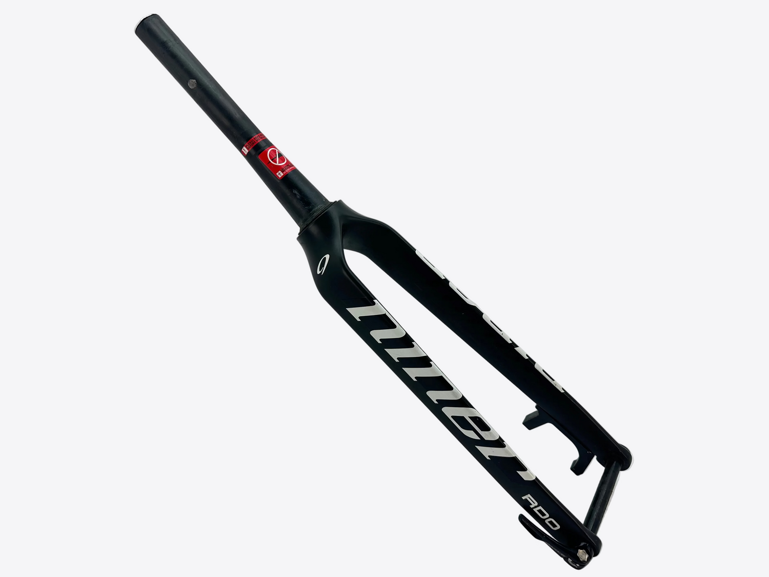 Black bicycle fork with white branding on a light gray background