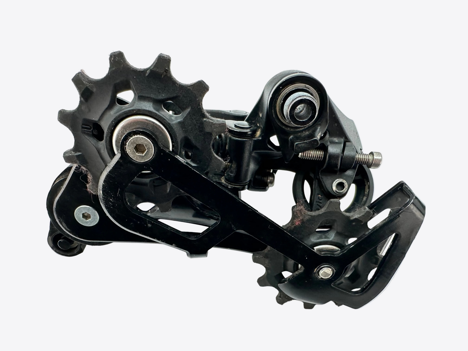 Black bicycle gear mechanism on a white background