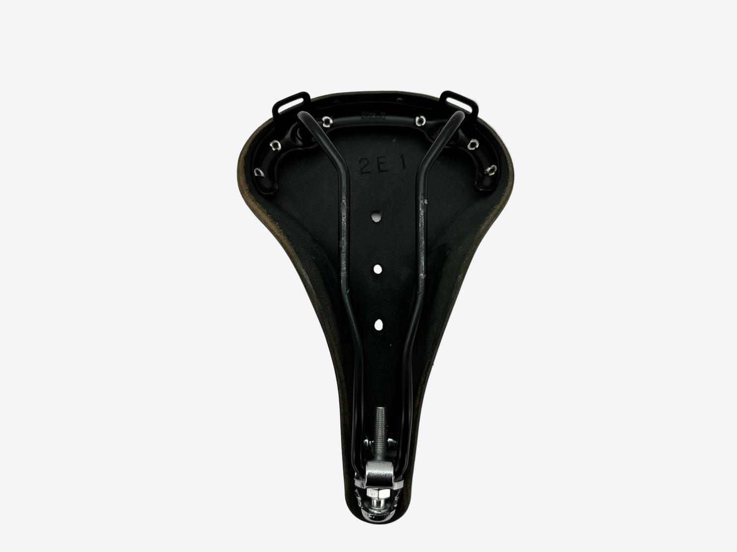 Black bicycle saddle on a light gray background
