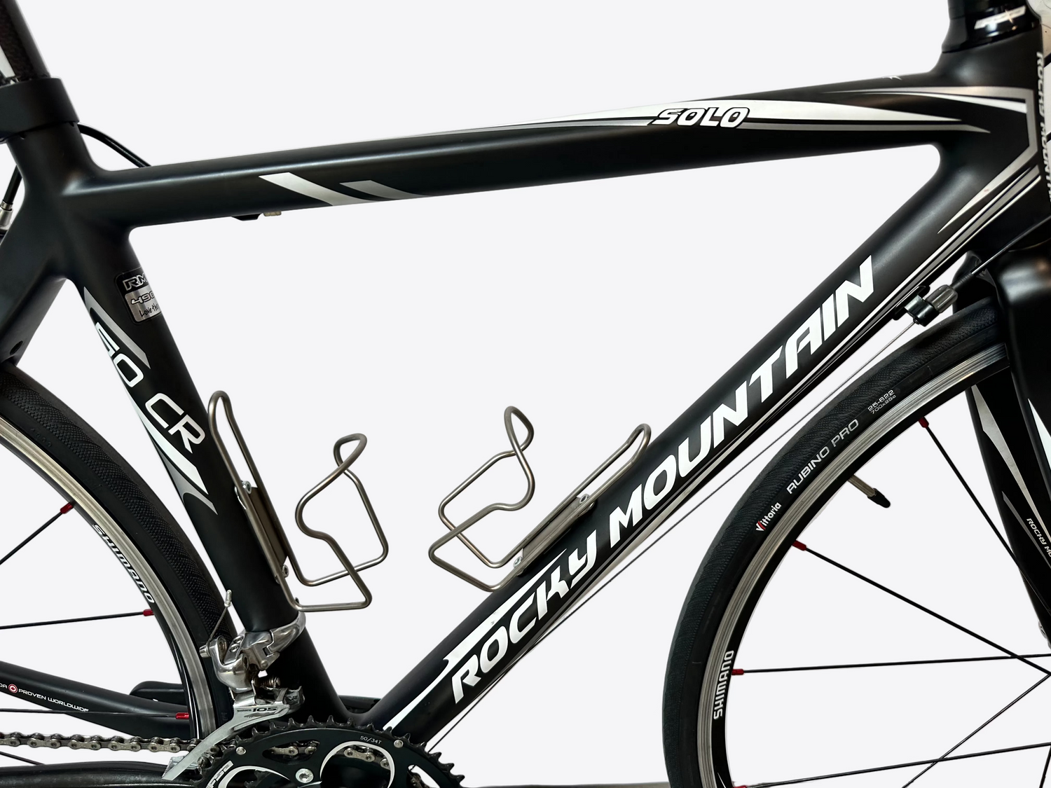 Black Rocky Mountain bicycle frame with white lettering on a light gray background