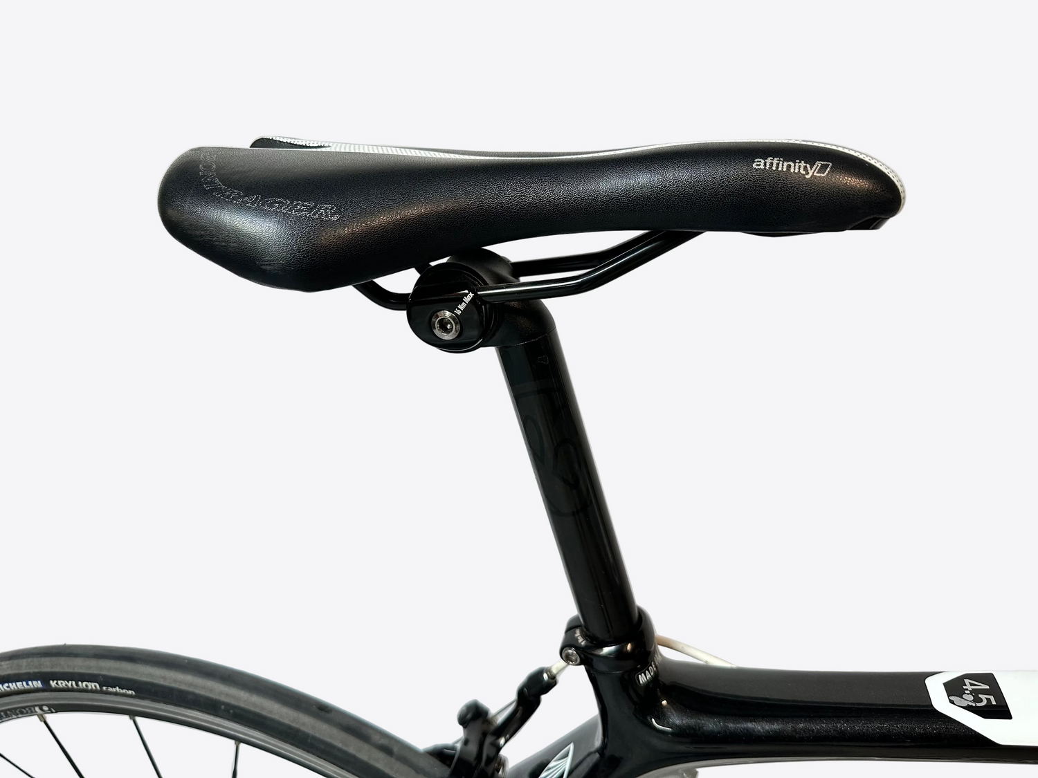 Bicycle seat with 'affinity' branding on a white background