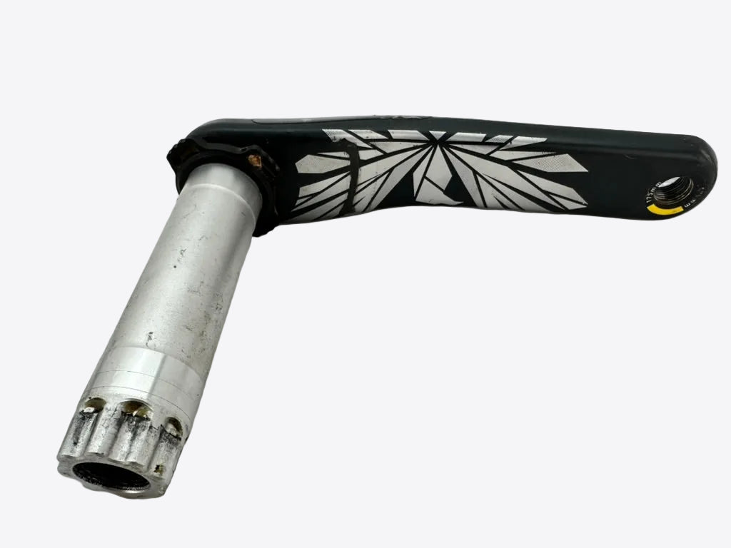 Bicycle crank arm with black and white design on a white background