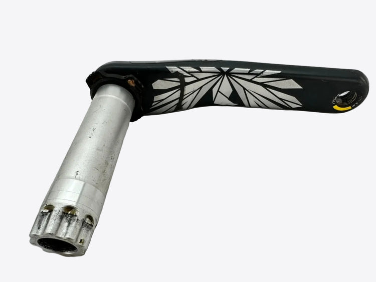 Bicycle crank arm with black and white design on a white background